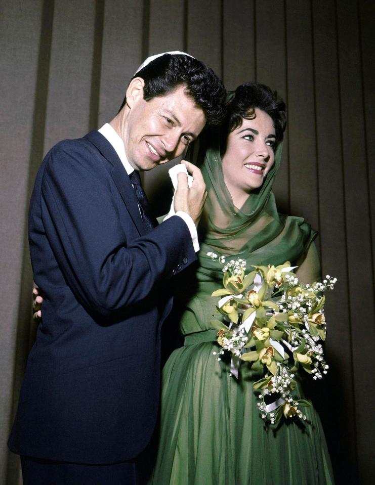  Singer Eddie Fisher with Elizabeth Taylor on their wedding day