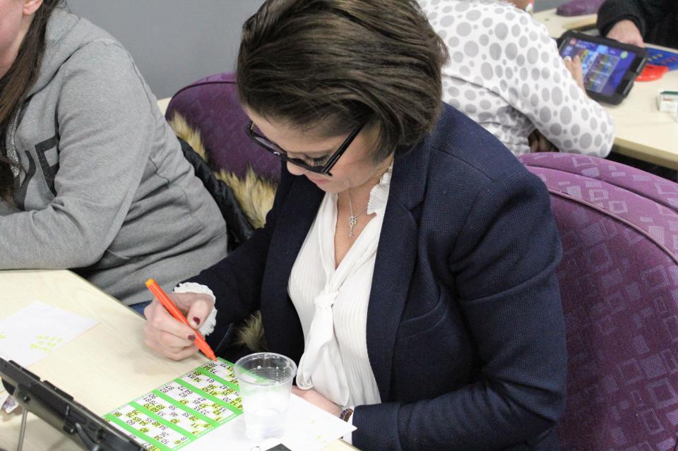  She was seen concentrating hard as she played her numbers during the bingo game