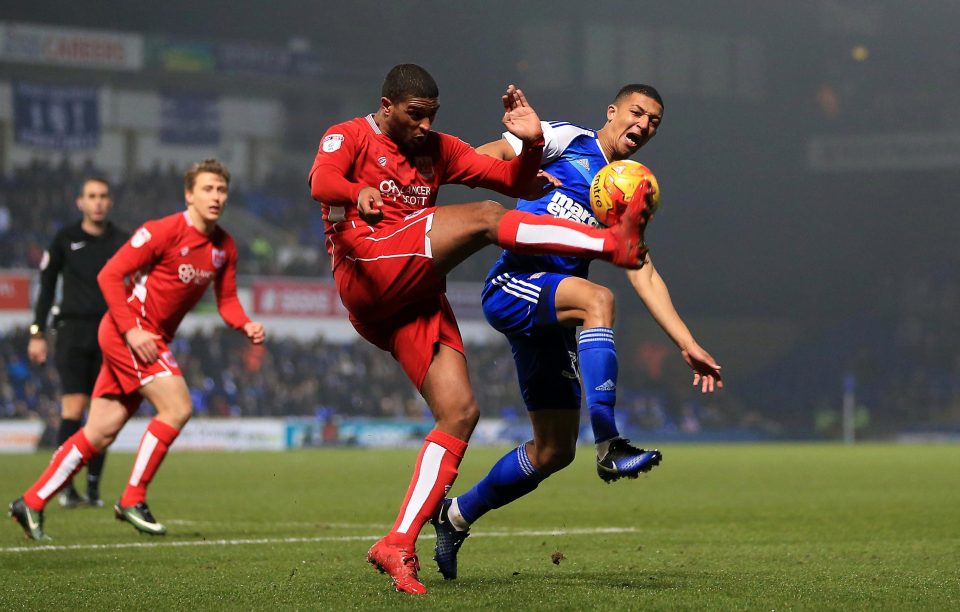  Miles Kenlock of Ipswich and Mark Little of Bristol battle it out for the ball