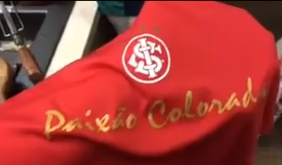  Internacional fans throw their shirts into the fire