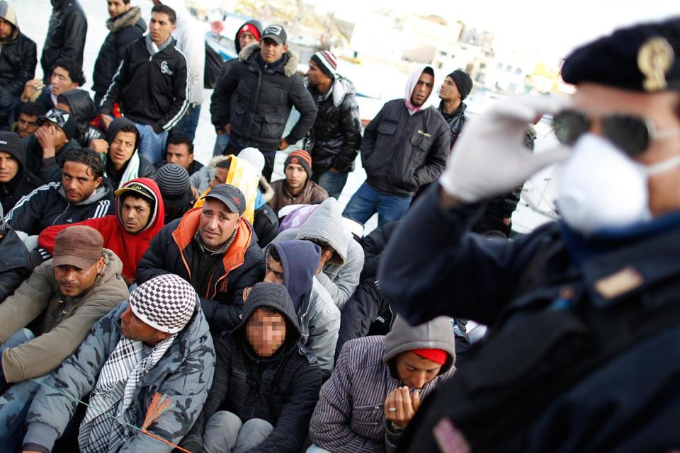  This picture, taken in April 2011 is said to show the first days of Anis Amri's five years in Europe after he made the crossing from Tunisia to Lampedusa. It first appeared in Italian media