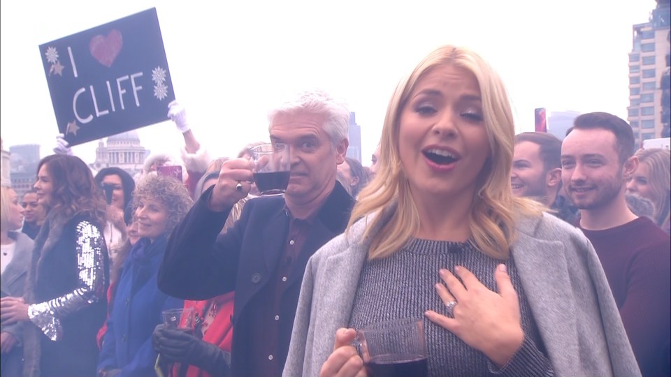  Phil made a face to the camera as Holly sang along to Cliff Richard