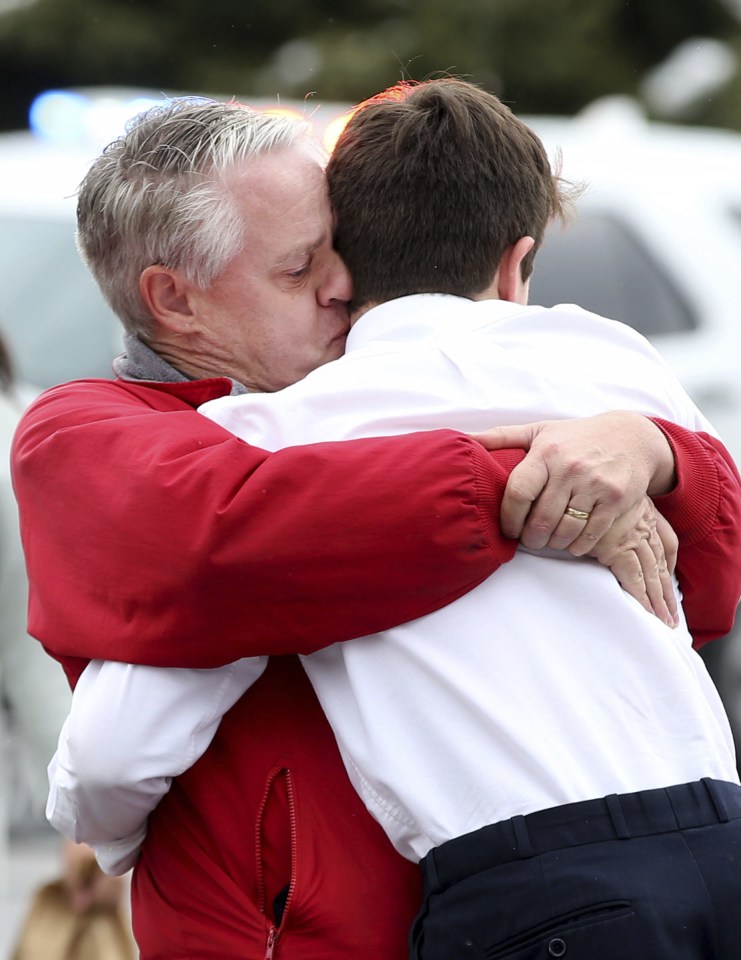  David Fowers, kisses his son Dan, a ninth-grad student at Mueller Park Jr. High