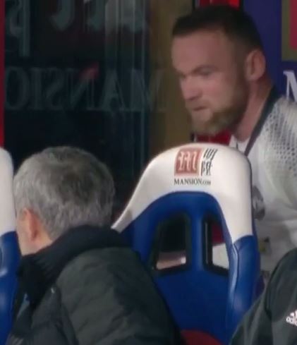  Jose Mourinho turns around to catch Wayne Rooney in the act