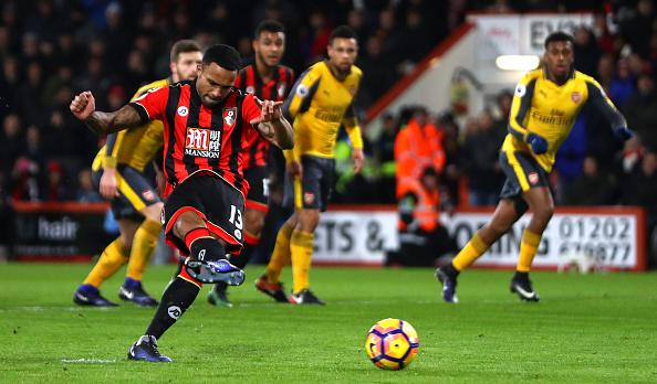 Callum Wilson slots home Bournemouth's second from the spot