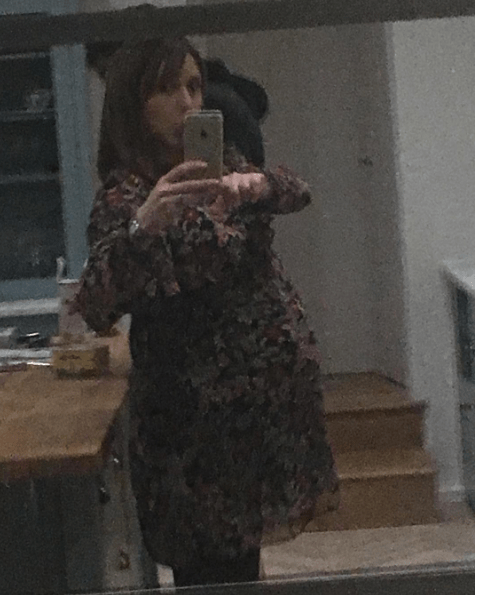 Alex Jones shared a snap of her baby bump and said she's "shocked" at hoe big it is