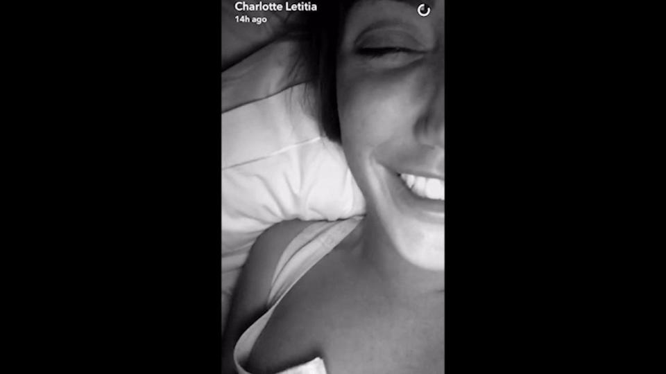  The Snapchat video sees Charlotte laughing in bed with a male friend