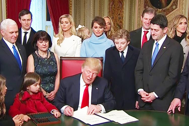  Donald Trump formally "signed in" as US President - but his grand-daughter Arabella Kushner (in red) stole the show