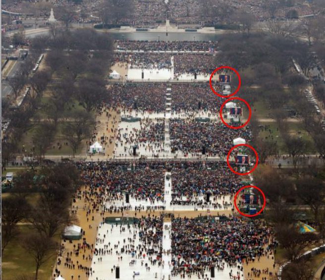  Huge patches of white tarpaulin are still visible when Donald Trump is on stage