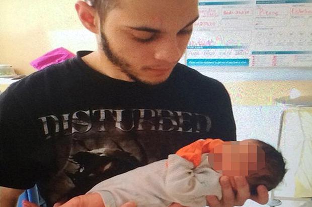  Suspected gunman Santiago-Ruiz pictured with his baby