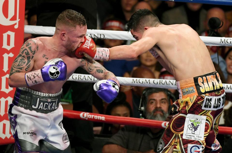  Haye was in Las Vegas as he watched a brave Carl Frampton, left, lose his featherweight title to Leo Santa Cruz