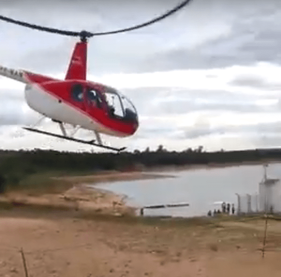  The terrifying footage shows the helicopter circling round a lake before crashing at low altitude