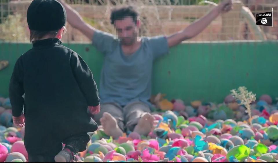  The young boy walks up to his victim, still alive but unconscious, over old and dusty balls in an abandoned ball pit