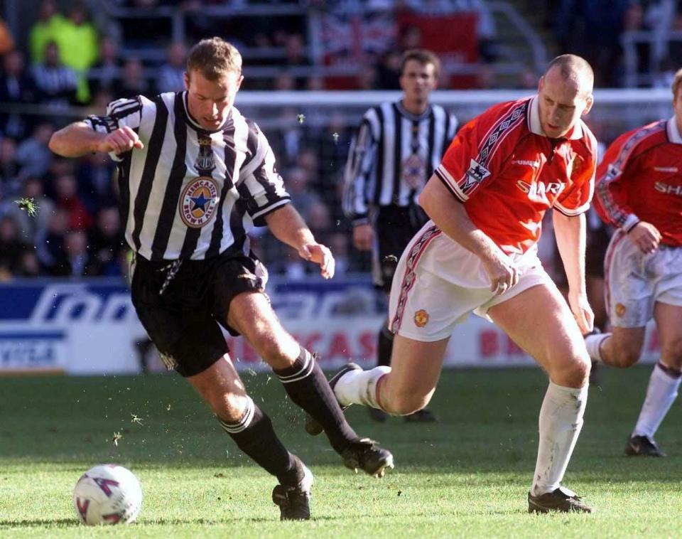 Jaap Stam battles with Alan Shearer during his Manchester United days