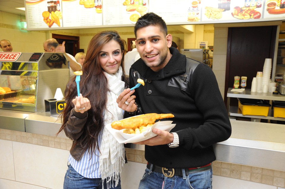 Amir Khan and his wife Faryal Makhdoom chomp down on some fish and chips in Bolton