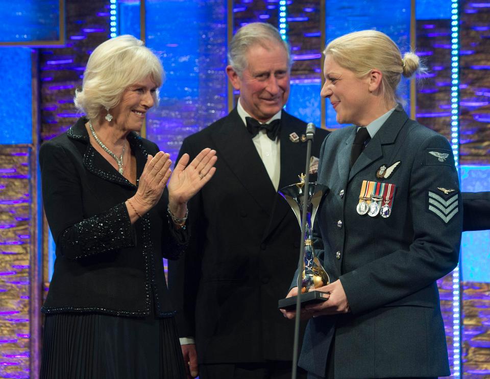  Anna was presented with a Millie award for Most Outstanding Airman by Prince Charles and Camilla for rescuing injured troops in Afghanistan and manning a machine gun as they escaped in a Chinook helicopter