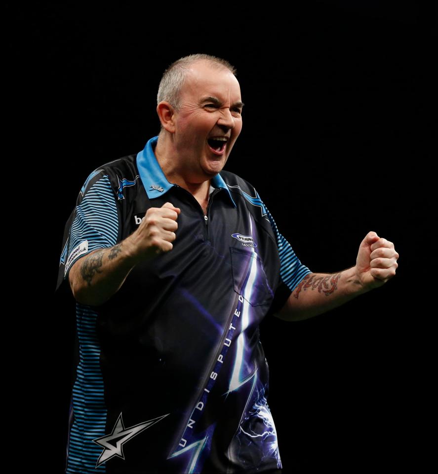  Phil Taylor celebrates victory in Cardiff