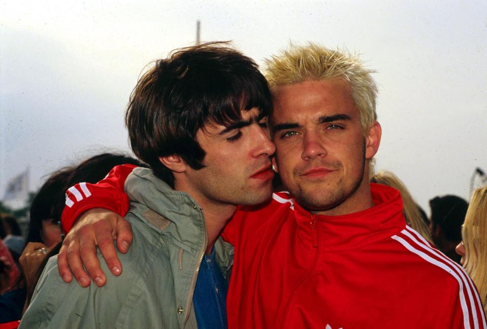  Nineties kids . . . Robbie Williams and Liam Gallagher at Glastonbury Festival in 1995