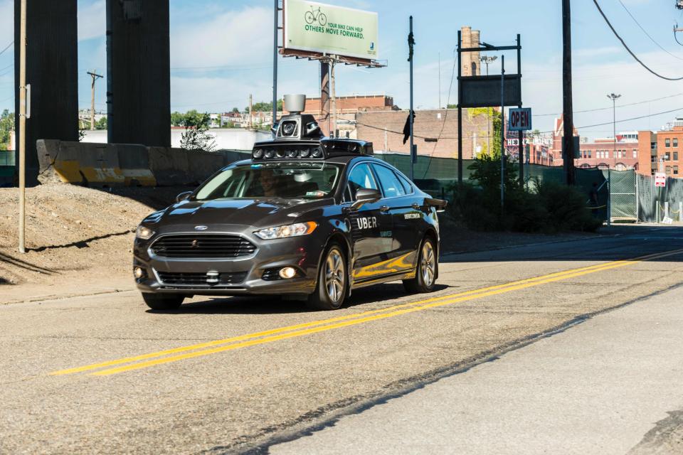 Uber, Google and Tesla Motors are in a race to build the first safe self-driving car