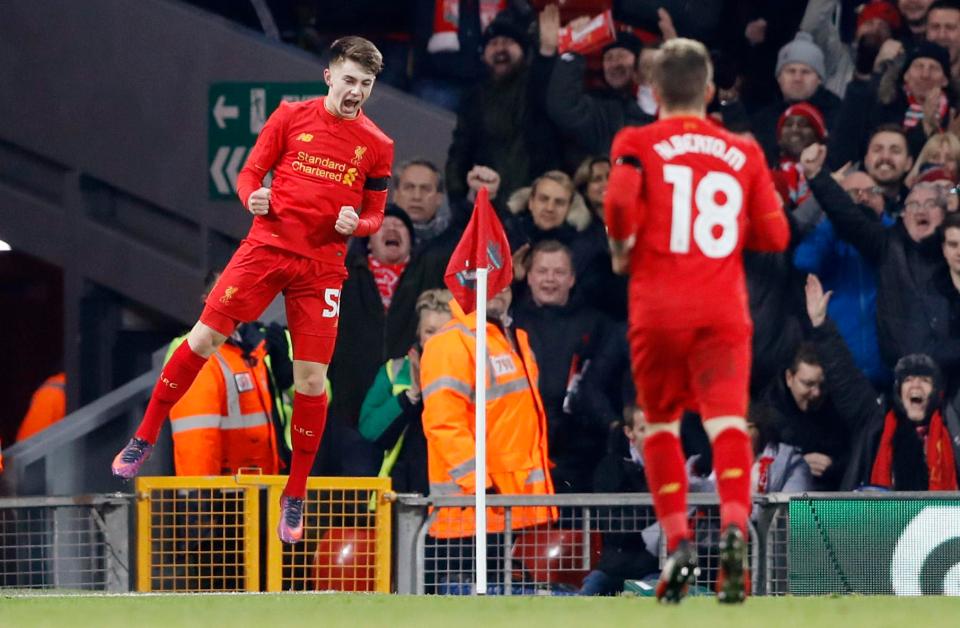 Ben Woodburn celebrates becoming Liverpool's youngest goalscorer and breaking Michael Owen's 19-year-old mark