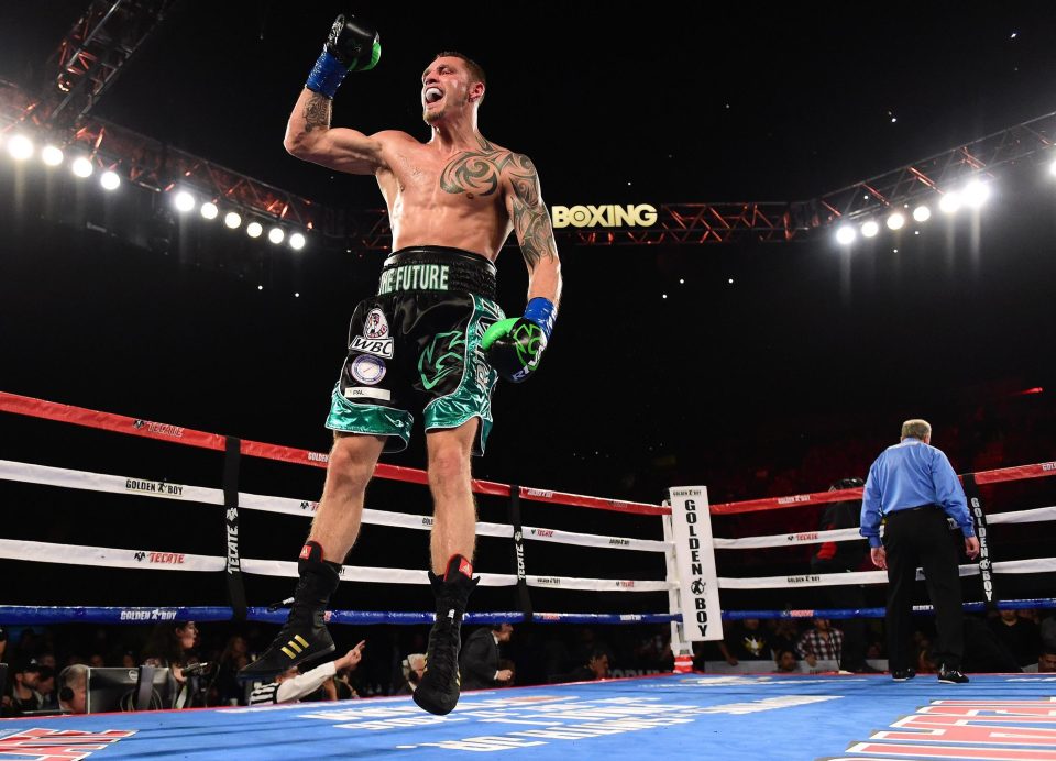  Joe Smith wheels away in delight when he realises Hopkins had been counted out and he had won the belt