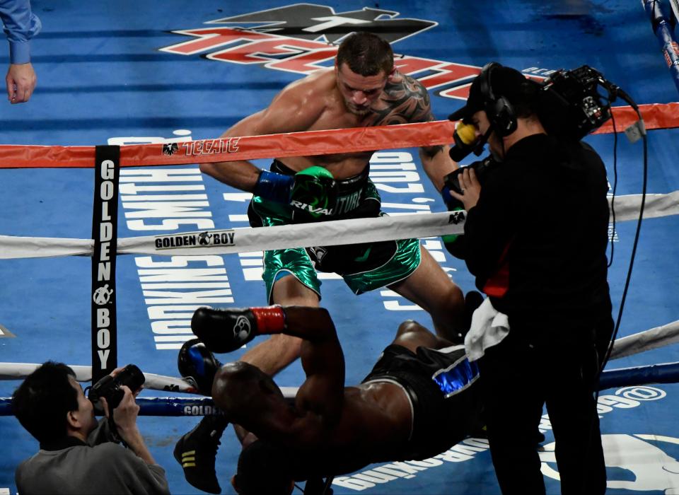  This was the moment Smith delivered a KO blow that sent Bernard Hopkins crashing through the ropes