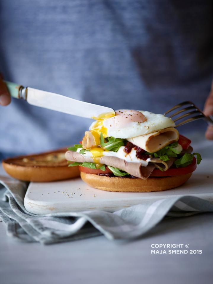  A bagel topped with meat, egg, veg and cheese will get your day off to a great start