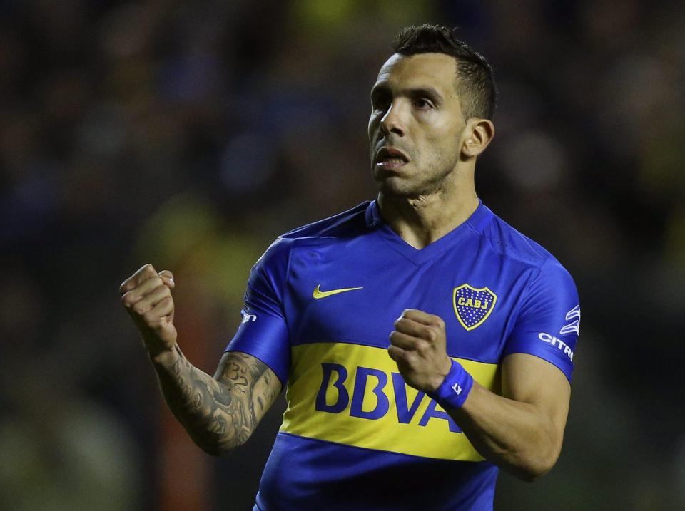 Carlos Tevez had reason to celebrate after becoming the best-paid player in the world 