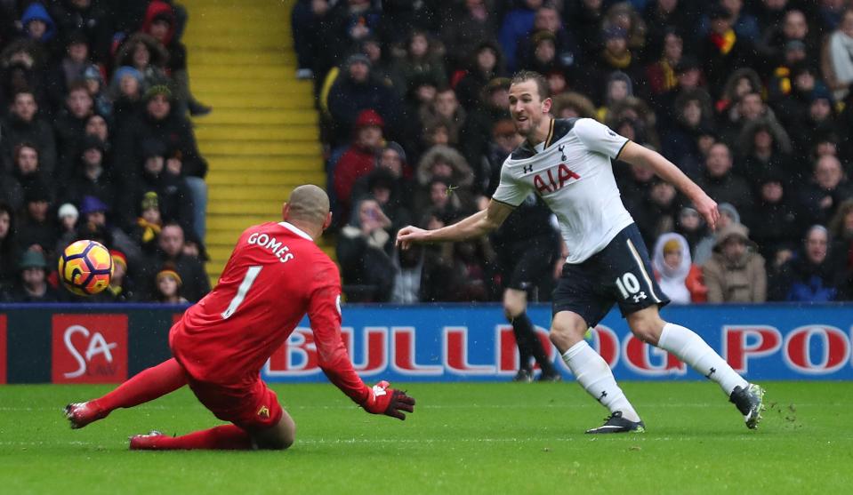  Harry Kane shoots past Heurelho Gomes to put Tottenham one-up at Watford