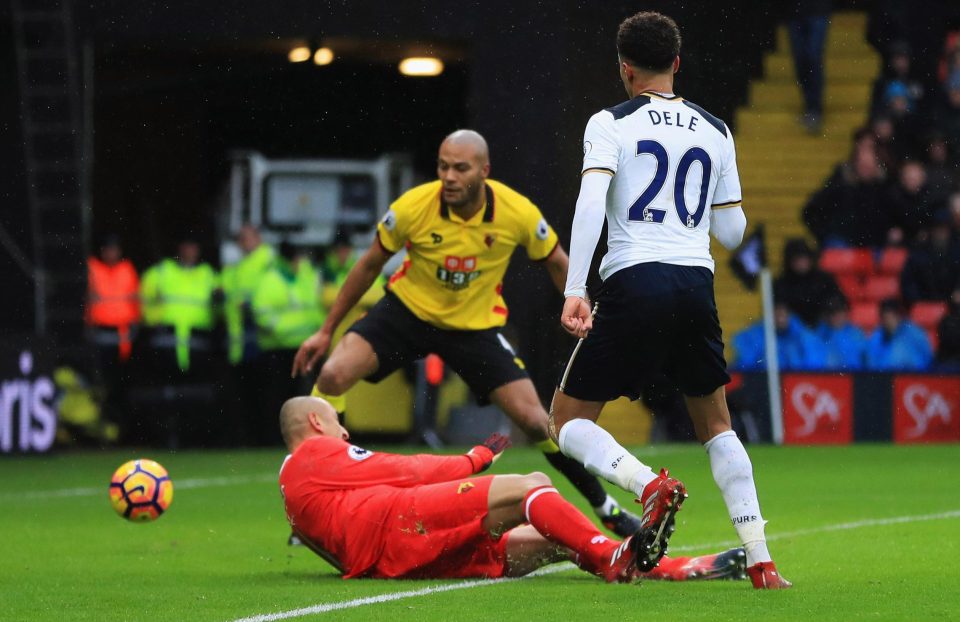  Dele Alli seizes on a Younes Kaboul mistake to slot home his first goal of the game