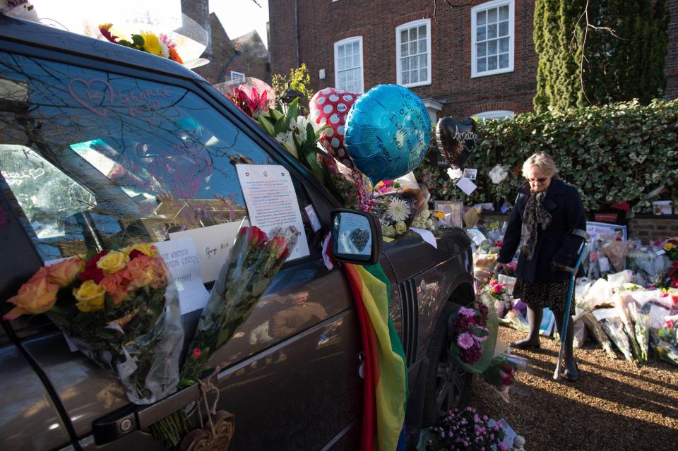 The Highgate home of George Michael where fans are laying floral tributes outside and on the singers car 