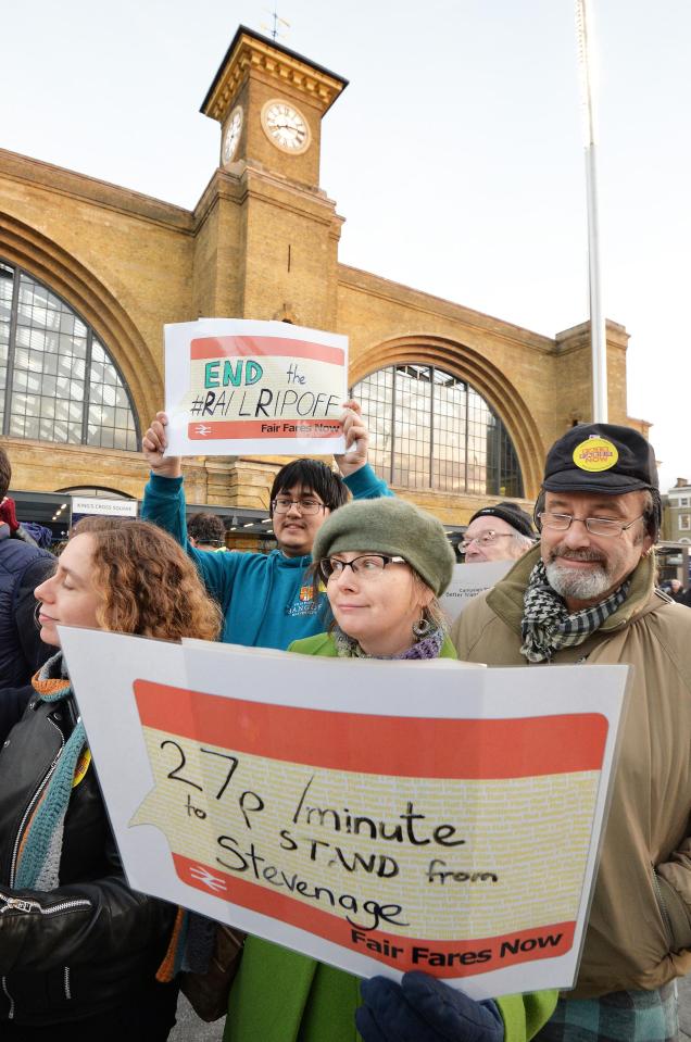  Commuters protesting raised ticket prices outside King's Cross Station this morning