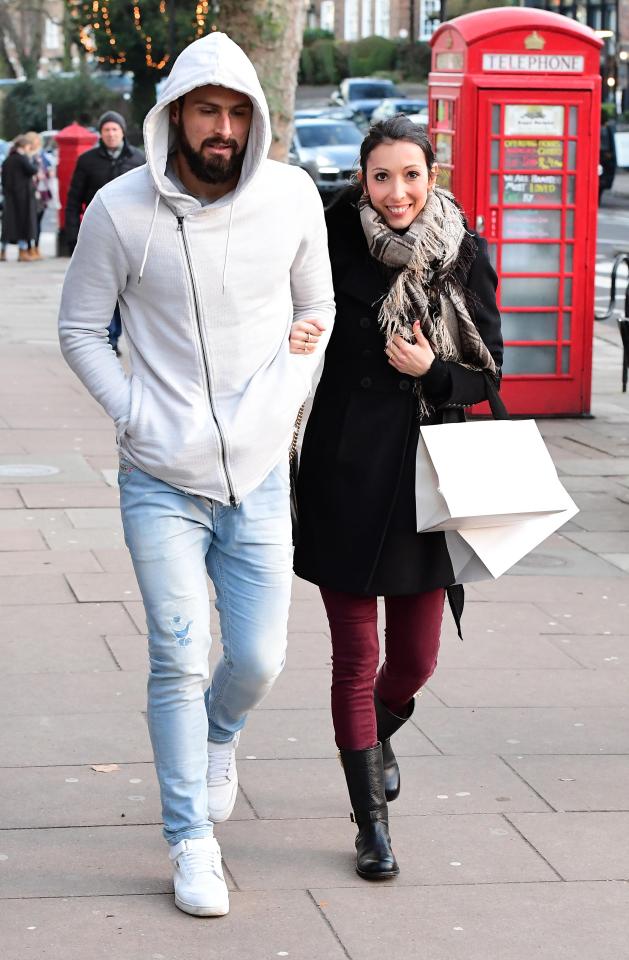 Man of the moment Olivier Giroud was snapped out and about with his wife Jennifer after scoring a stunning opener for Arsenal against Crystal Palace