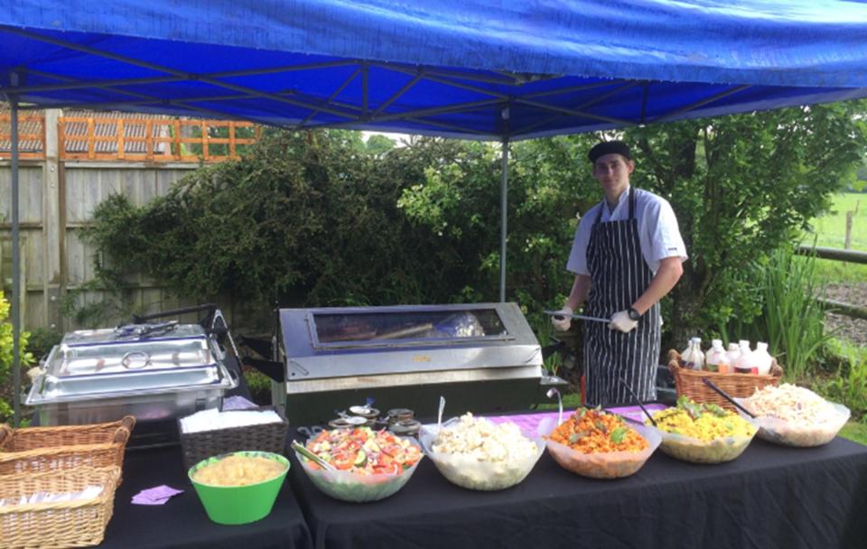  Ryan Lock helps serve a hog roast at a Hampshire wedding the day before jetting off to war zone