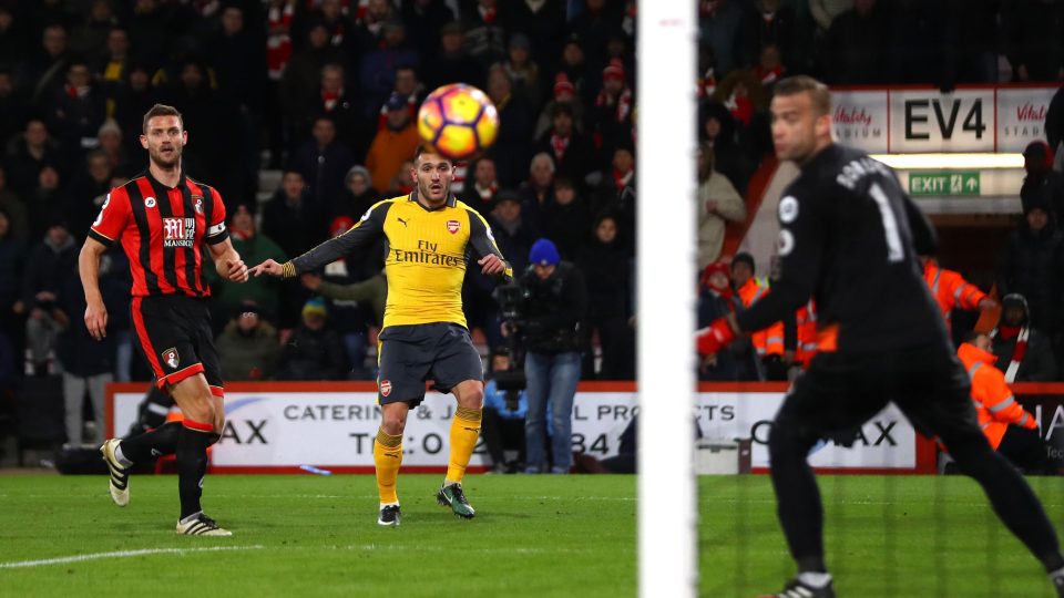 Lucas Perez volleys the ball inside the near post