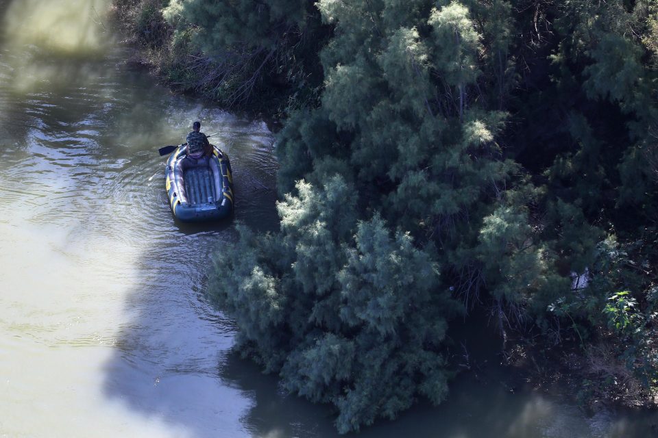  A suspected smuggler is pictured on the Mexican side of the river