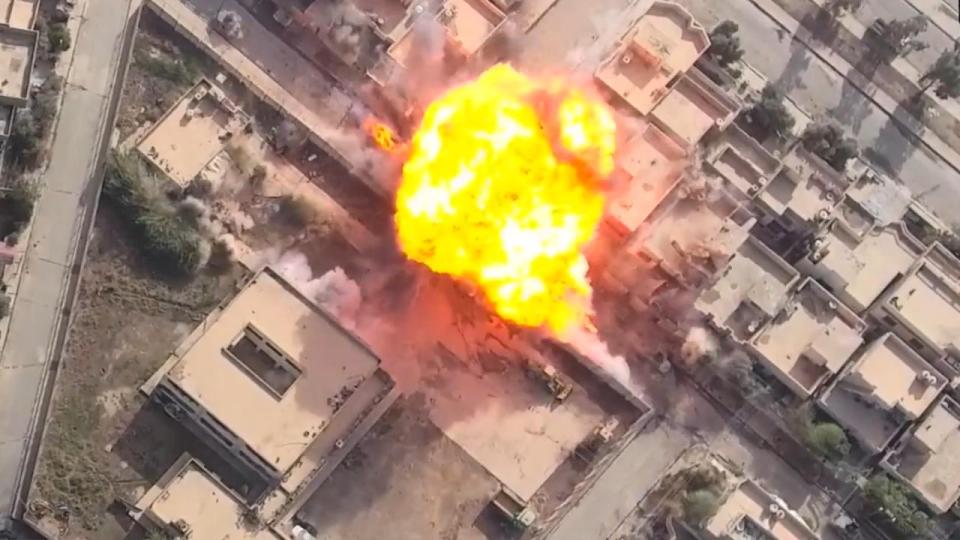  Drone video shows an explosion from where a bomb was dropped on a target in Mosul