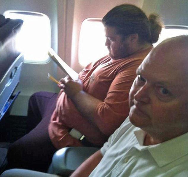  One man found himself seated next to a guy who bore a striking resemblance to the character of Hurley from Lost and captioned the image: "I have a bad feeling about this flight"