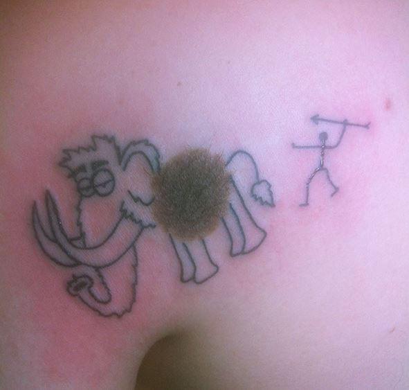  A body art fan transformed his brown spot into a cute woolly mammoth inking