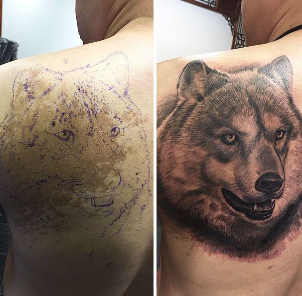  A man used the birthmark on his back as inspiration for a striking wolf tattoo