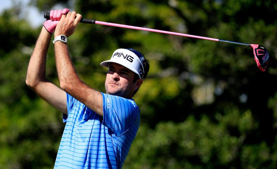  Bubba Watson gets plenty of attention on his hands as the golf star swings his driver