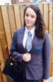  She was wearing a school uniform comprising a grey blazer, grey skirt and white shirt