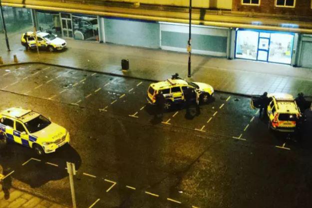  Armed police were pictured surrounding a Coral bookies in the north eastern town of Jarrow