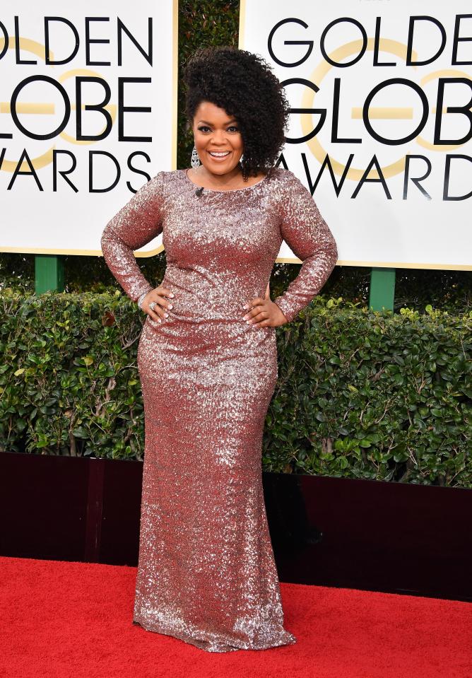  Walking Dead star Yvette Nicole Brown wore a shimmering number which accentuated her figure...