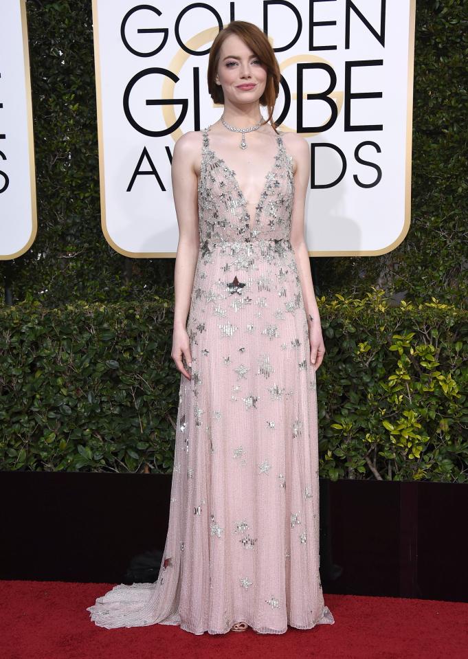  The La La Land actress's pink hued dress had stars dripping down the floor-length gown