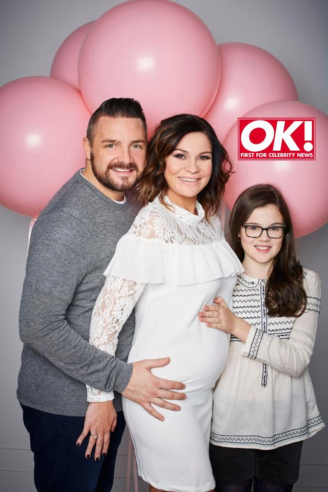  Lucy, pictured here with her fiance Rudi and their 11-year-old daughter Lola