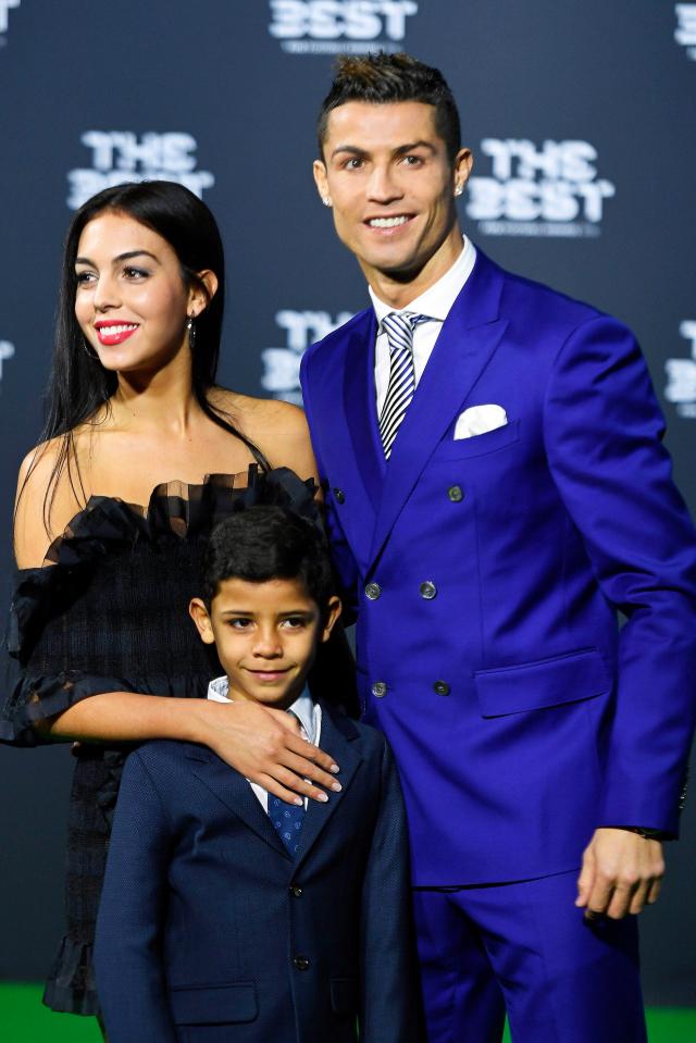  Cristiano Ronaldo, his girlfriend Georgina Rodriguez,, and his son Ronaldo Jr pose for photos