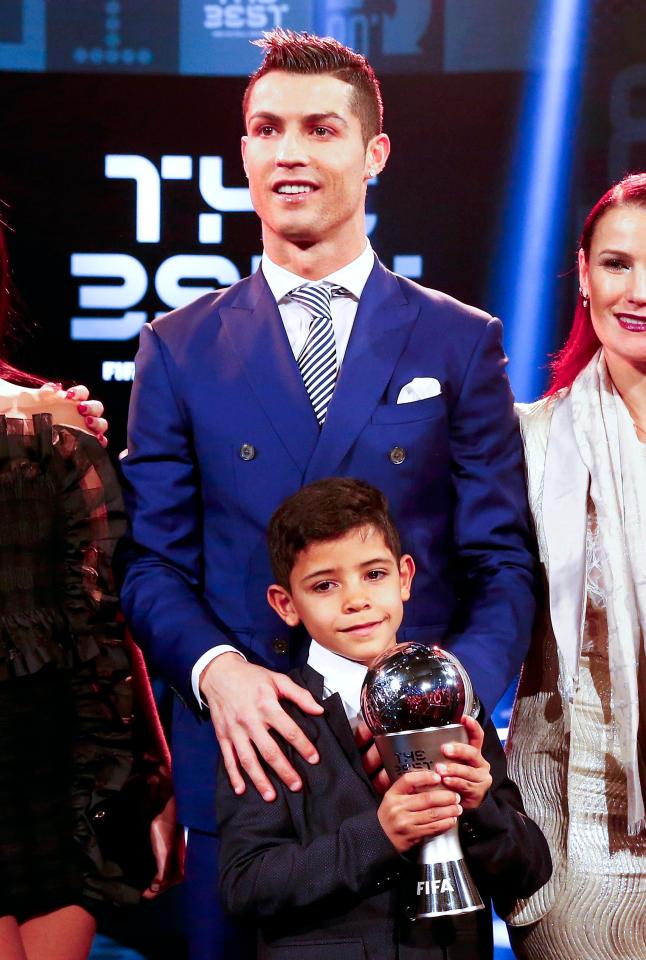  Ronaldo Jr holds the trophy - can he follow in his father's incredible and star-studded footsteps?