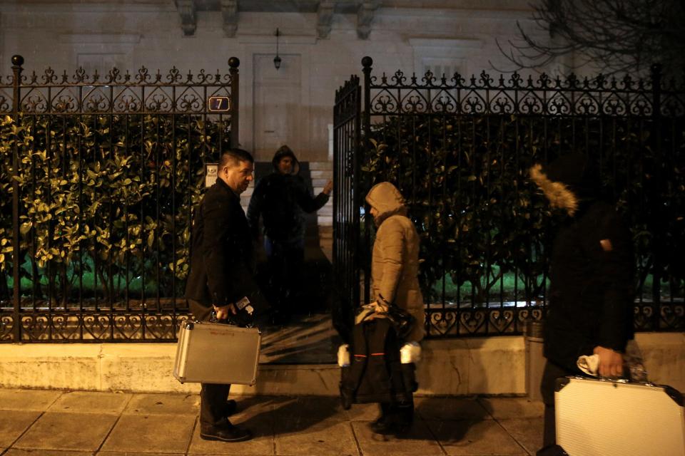  Police were pictured entering the flat of Andrey Malanin as Greek police confirmed the murder squad would examine the case