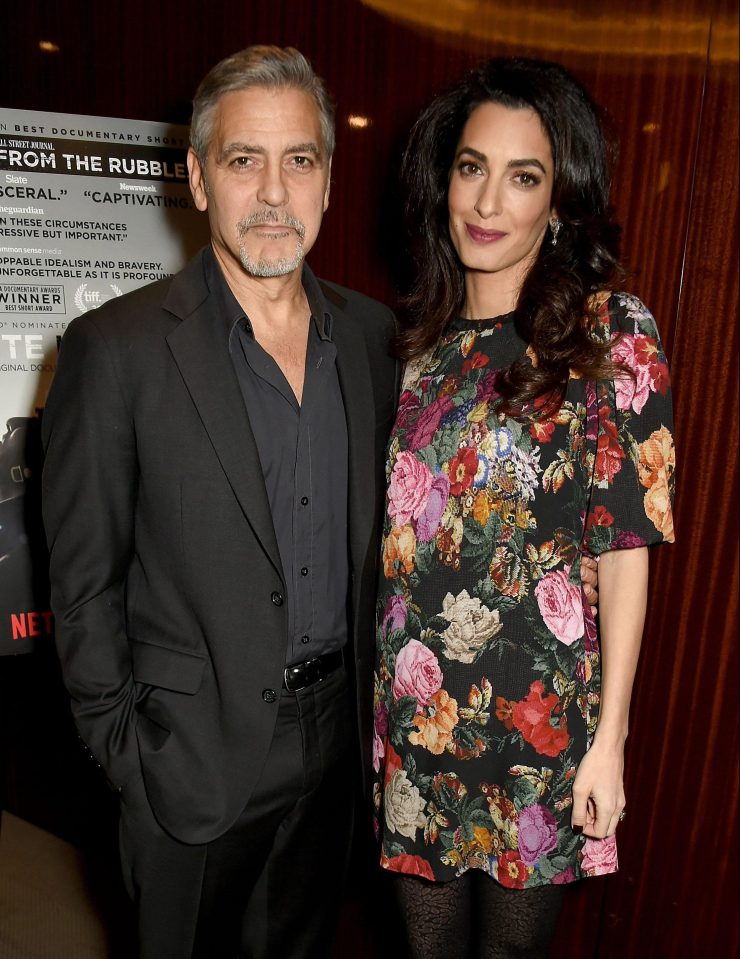  George Clooney pictured with wife Amal at the Netflix special screening and reception of The White Helmets